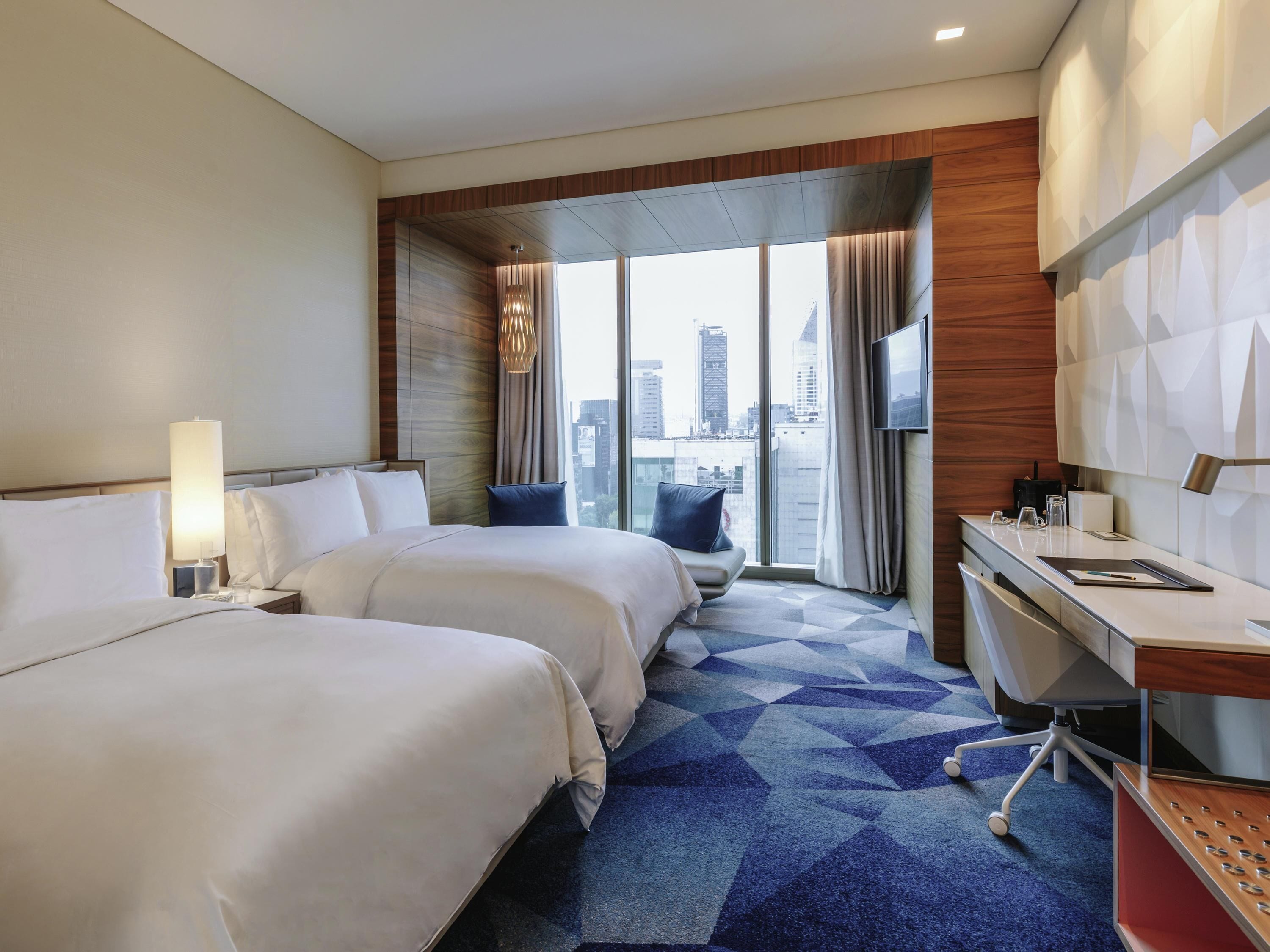 Ropa de cama de alta calidad y minibar 