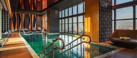 Indoor pool, open 7:30 AM to 10:00 PM, pool loungers