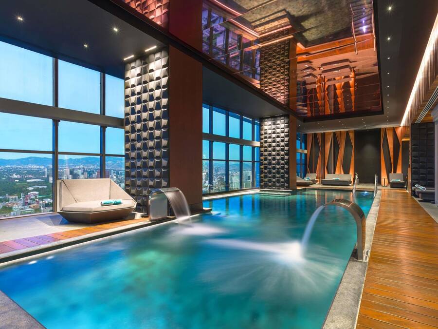 Indoor pool, open 7:30 AM to 10:00 PM, pool loungers