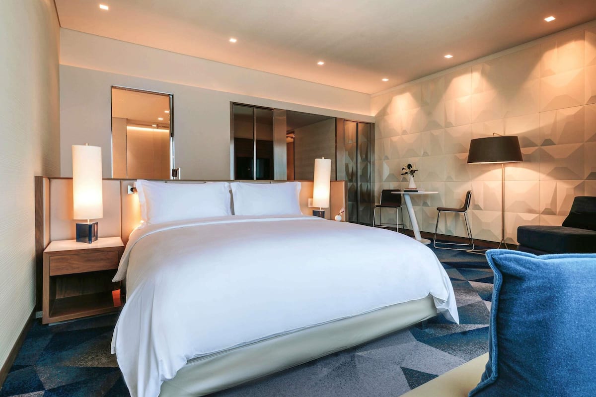 Ropa de cama de alta calidad y minibar