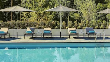 Seasonal outdoor pool, open 8:00 AM to 10:00 PM, sun loungers