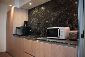 Cuarto Privado con Cama Matrimonial (3E) | Microondas