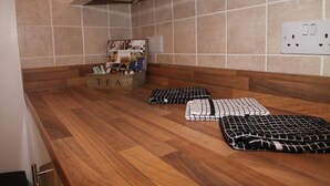 Appartamento Luxury | Cucina privata | Frigorifero, microonde, forno, piano cottura