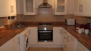 Appartamento Luxury | Cucina privata | Frigorifero, microonde, forno, piano cottura