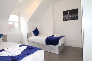 Luxury Apartment | Iron/ironing board, bed sheets
