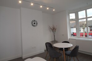 Luxury Apartment | Living area | Flat-screen TV