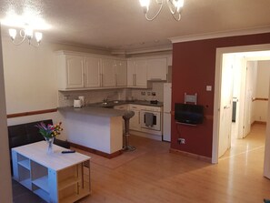 Luxury Apartment | Living area | Flat-screen TV - The Vicarage Apartment (Grays)