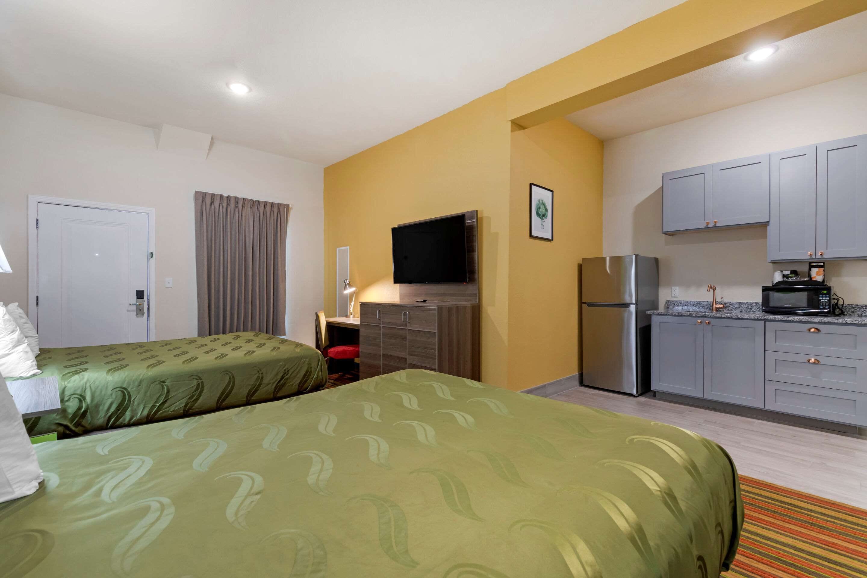 Suite, 2 Queen Beds, Non Smoking | Free cots/infant beds, free WiFi, bed sheets