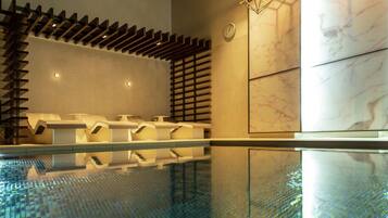 Indoor pool, open 6:00 AM to 10:00 PM, sun loungers
