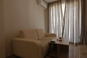 Luxury Apartment, 1 Bedroom | Living area | Flat-screen TV - Luxury Apartment in Anastasia Palace (Sunny Beach)