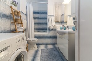 Shower, free toiletries, hair dryer, towels
