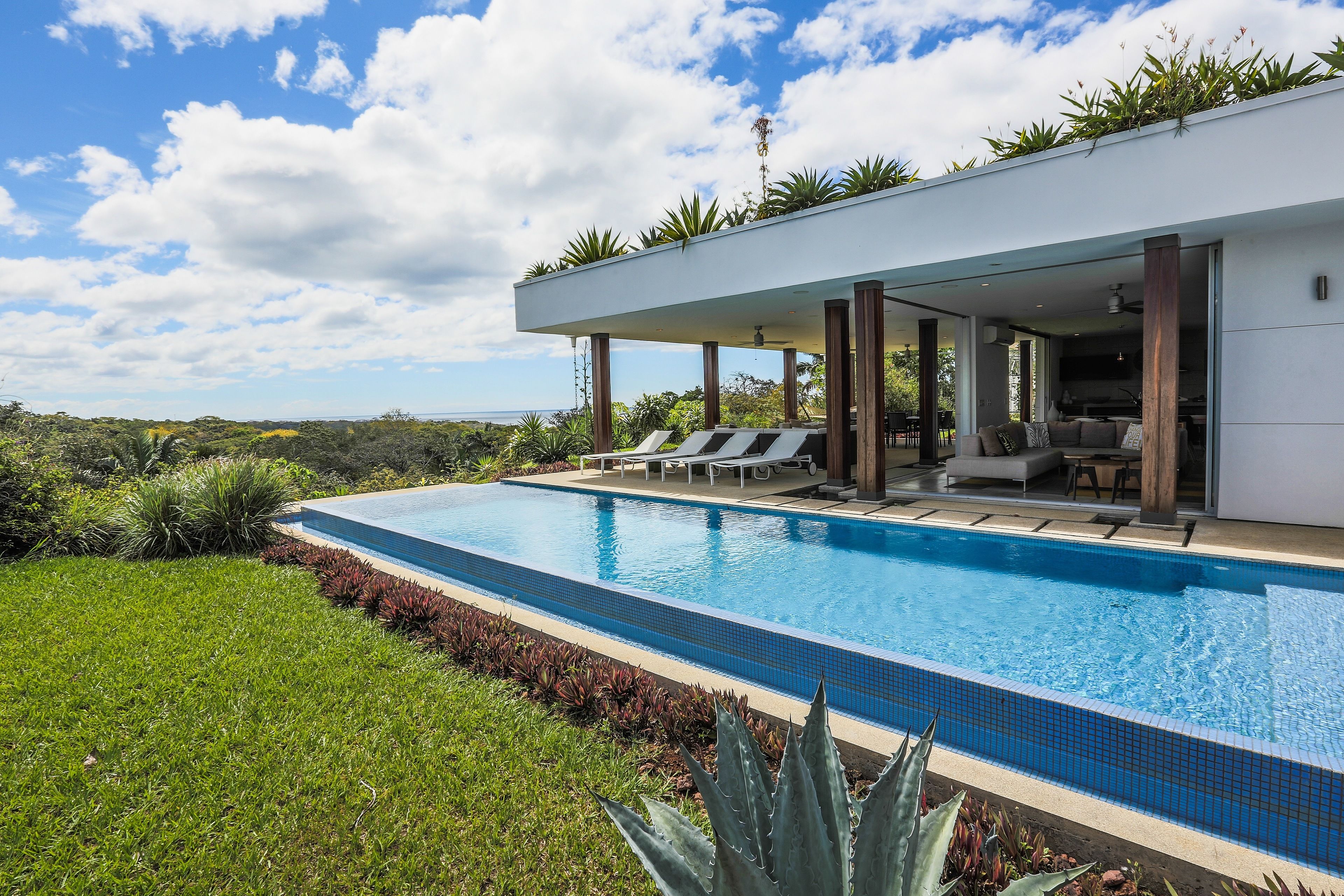 Outdoor pool, pool umbrellas, pool loungers