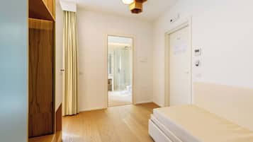 Suite Junior | Copriletto in piuma, materassi in memory foam, minibar