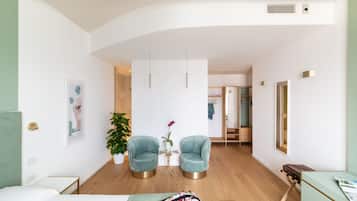 Junior Suite, Sea View | Down duvets, memory-foam beds, minibar, in-room safe
