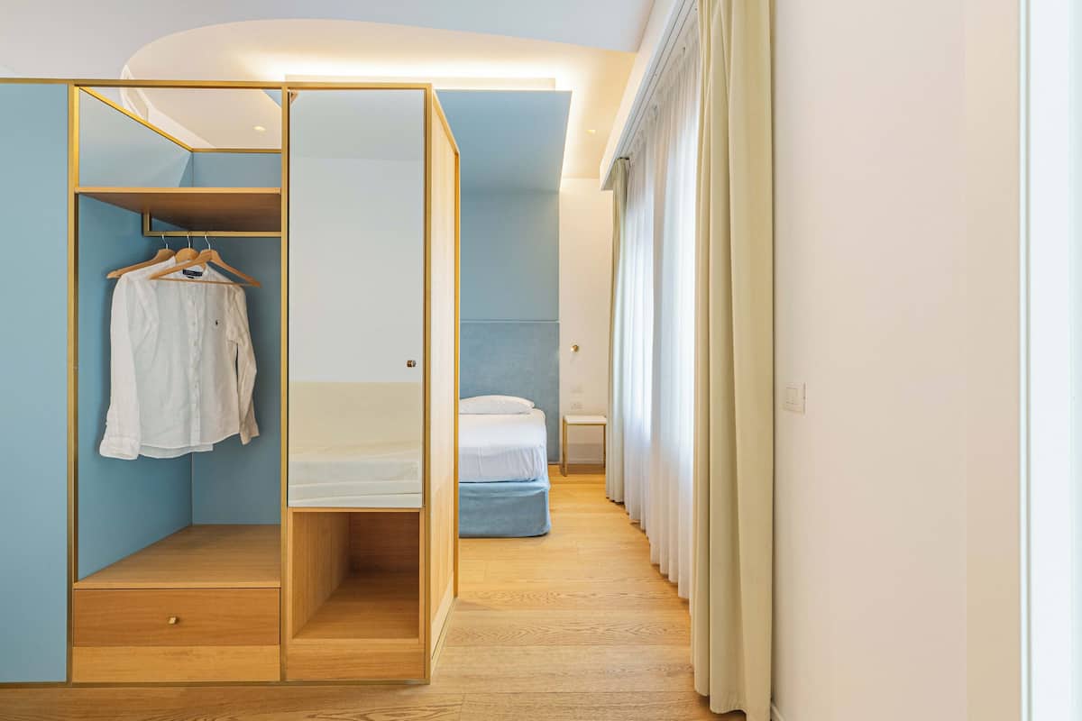 Junior Suite | 1 bedroom, down comforters, memory foam beds, minibar