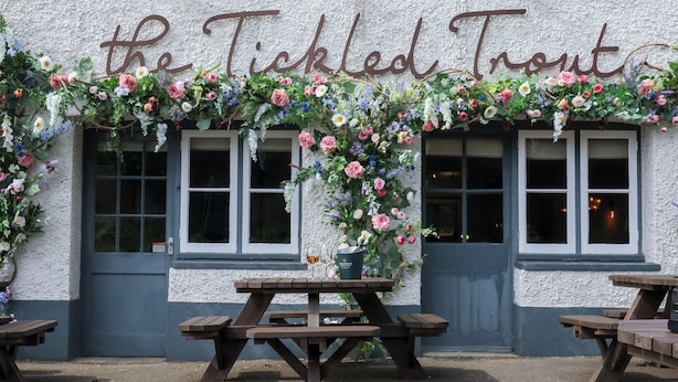 A building with a sign reading "the Tickled Trout" and outdoor seating. - The Tickled Trout (Maidstone)