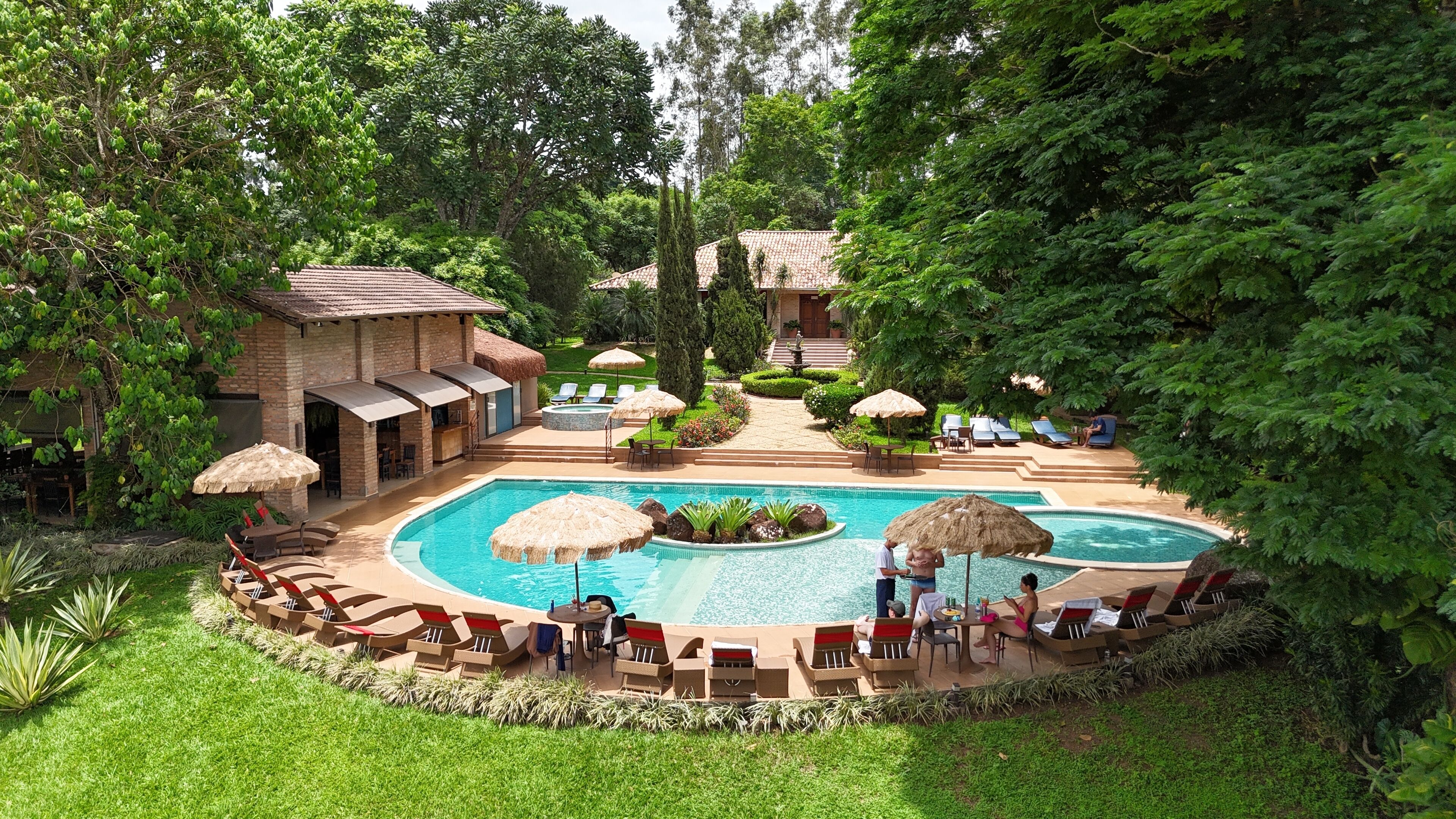 indoor pool, open 8:30 am to 9:00 pm, pool umbrellas, pool loungers