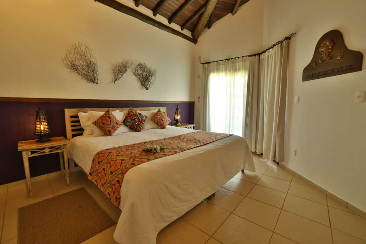 deluxe room, garden view (fenix) | 1 bedroom, minibar, in-room safe, cots/infant beds