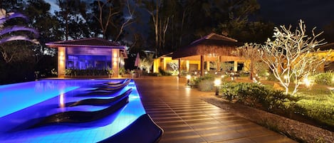Indoor pool, open 8:30 AM to 9:00 PM, pool umbrellas, pool loungers