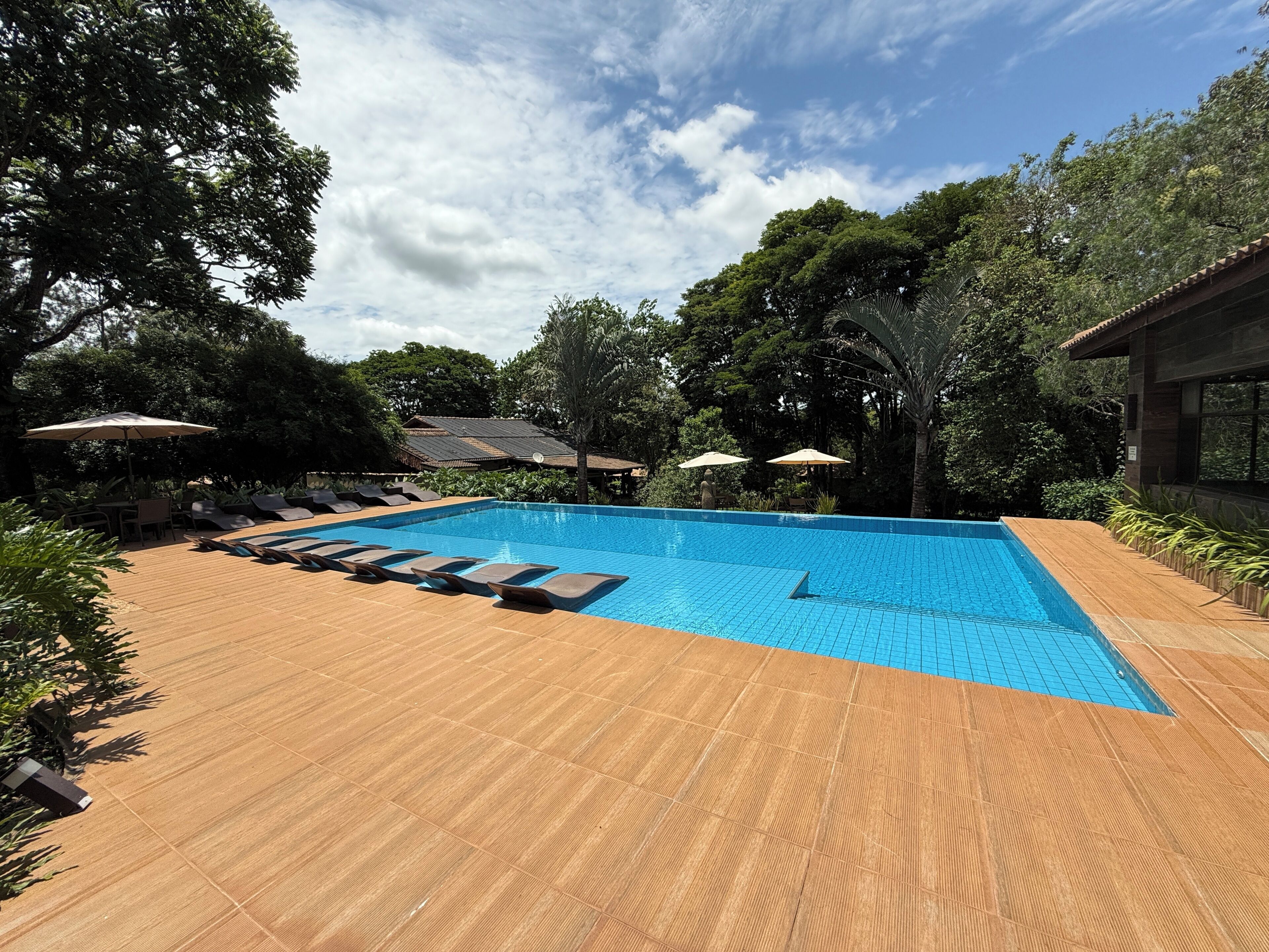 indoor pool, open 8:30 am to 9:00 pm, pool umbrellas, pool loungers