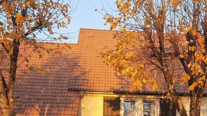 A two-story hotel with a tiled roof, a visible entrance, and a sign indicating it is the Doubs Hotel. - Doubs Hotel - Hostel (Ecole-Valentin)