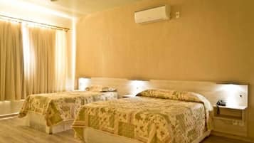 Frigobar, cortinas blackout, Wi-Fi de cortesia, roupa de cama