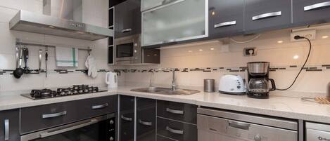 Fridge, microwave, oven, dishwasher