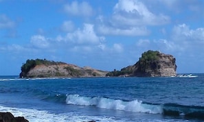 A coastal scene with two rocky islands and a clear blue sky. - THE LITTLE PARADISE VILLA T3 SEA VIEW, SWIMMING POOL, BEACH 200m (Sainte Marie)