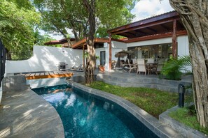 Outdoor pool, pool umbrellas, pool loungers