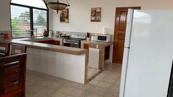 Luxury House, 2 Bedrooms, Jetted Tub (Volcano View) | Private kitchen | Fridge, microwave, oven, rice cooker
