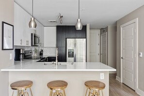 Signature Apartment, 1 Bedroom, Balcony (Self Check-in with Virtual Front Desk) | Private kitchen | Full-size fridge, microwave, oven, stovetop