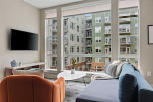 Family Apartment, 2 Bedrooms, 2 Bathrooms (Self Check-in with Virtual Front Desk) | Living area | 49-inch flat-screen TV with digital channels, TV, streaming services