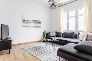 Deluxe Apartment | Living area | TV, Netflix, streaming services - UPSTREET Central Cozy Apartments in Plaka (Athens)