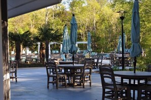 Outdoor dining - Beachwoods - 3BR/2.5BA - Largest Outdoor Pool in OBX, Indoor Water Park! (Kitty Hawk)