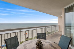Outdoor dining - Tropical 5th Floor Oceanfront Condo, Outdoor Hot Tubs | Crescent Shores - N 503 (North Myrtle Beach)