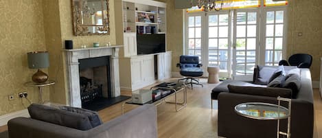 Smart TV, fireplace, music library, video library