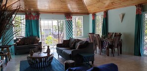 Comfort Villa, 3 Bedrooms | Living area | TV - Silver Dawn (Treasure Beach)