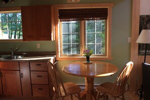 Kitchen table can seat 4  - Wedgwood Estate Cabins