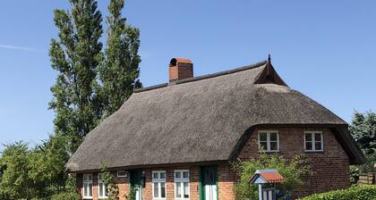 Comfortable farmer's card with lake view, 5 minutes drive to the beach, large garden