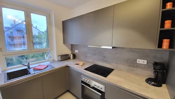 Réfrigérateur, four, plaque de cuisson, lave-vaisselle