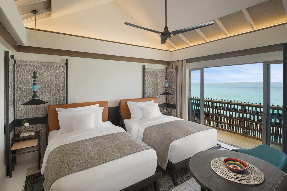 Premium bedding, down comforters, memory foam beds, minibar