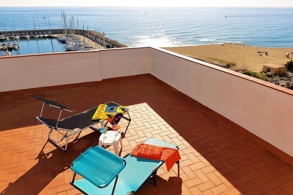 common sun roof terrace with 2 sun loungers