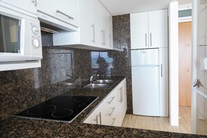 Fridge, microwave, coffee/tea maker, electric kettle