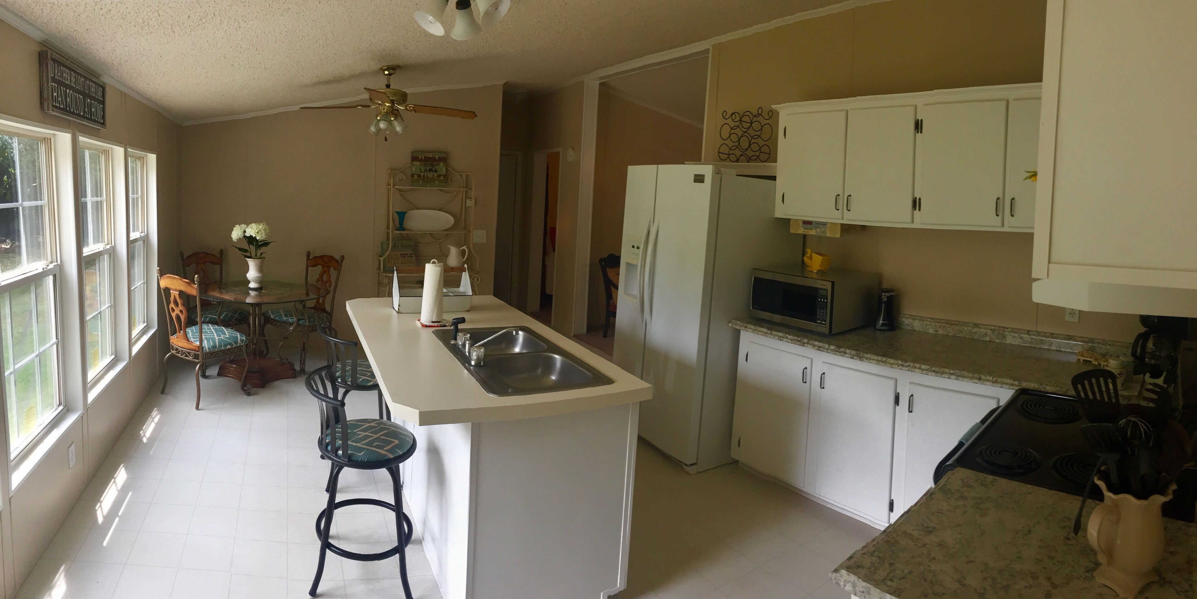 Updated Home across the street from the lake. With Private Dock and Land.