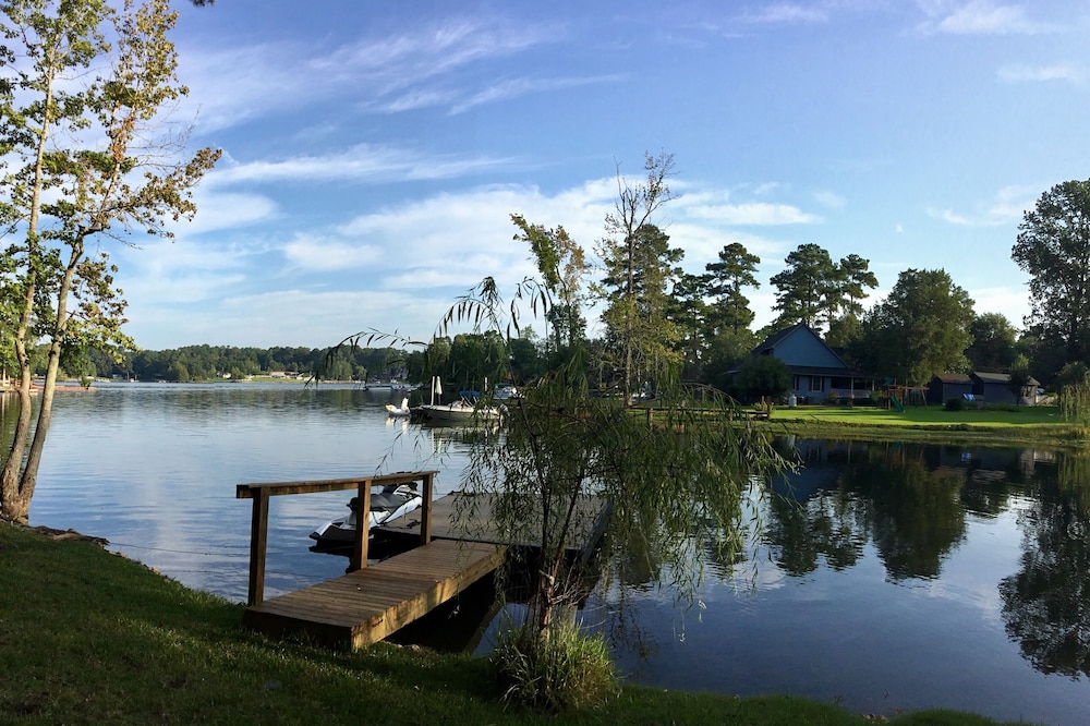 Updated Home across the street from the lake. With Private Dock and Land.