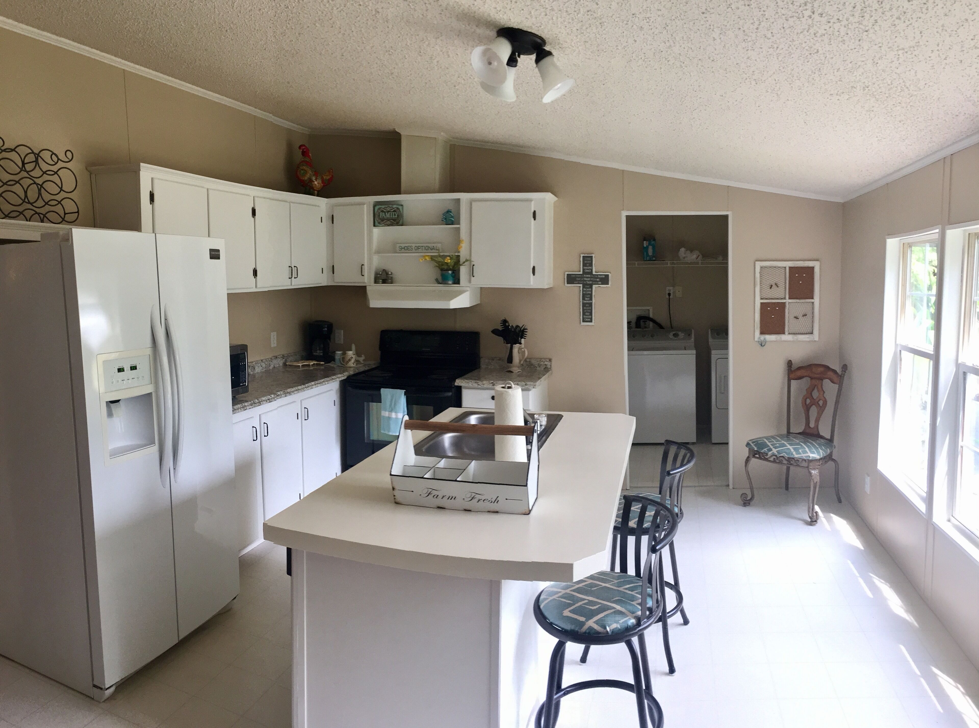 Updated Home across the street from the lake. With Private Dock and Land.