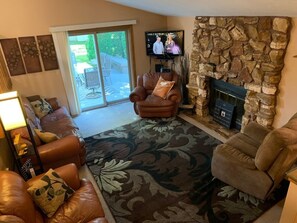 Flat-screen TV, fireplace, video games, DVD player