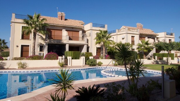 A two-story building with a swimming pool in front. - App,  2 bedroom ,2 terraces, Swimming pool + Parking, Wifi (Algorfa)