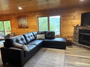 Smart TV, fireplace, table football, books