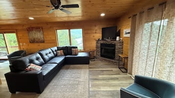 Smart TV, fireplace, table football, books